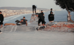 The trevelio surf camps logo